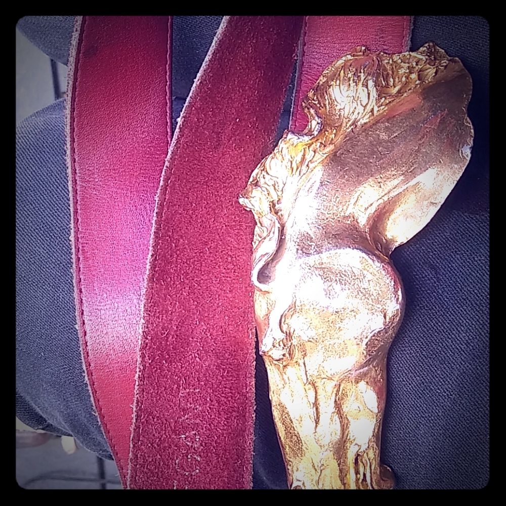 1976 collectable C. Ross gold over black belt.